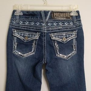 Premiere distressed embellished boot cut jeans